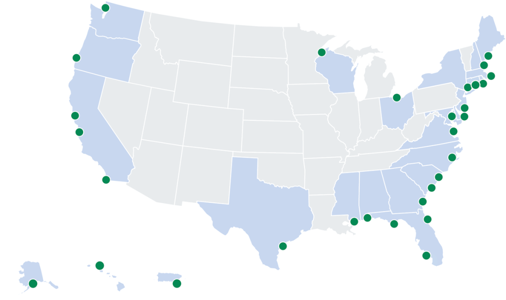 A basic map of the United States with green dots at NERRS locations